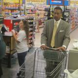 Congressman Cleaver shops for groceries with a local resident on minimum wage. 