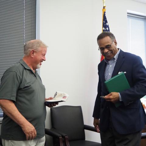 Congressman Cleaver presenting Mr. Fuhr with his Meritorious Medal and Certificate